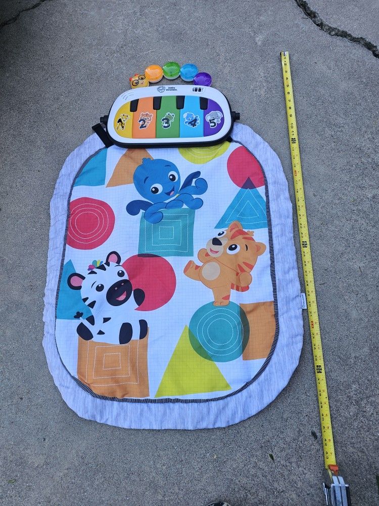 English / Spanish - Baby Einstein - Kick n Play - $20