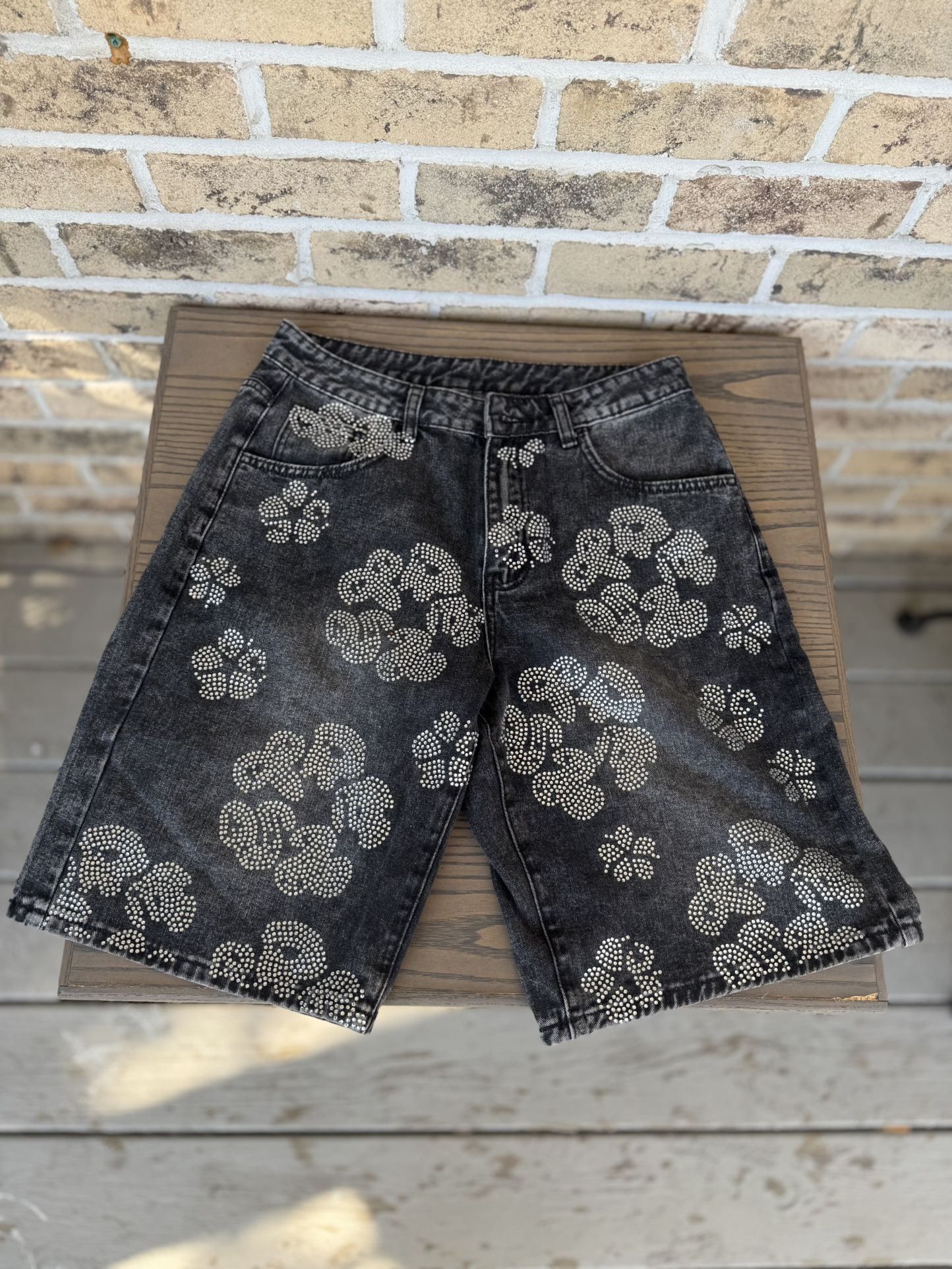 Black denim shorts with rhinestone with design