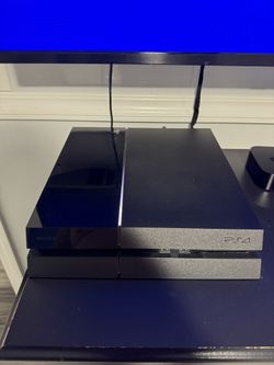 PS4 With Games, Two Controllers And Controller Charger