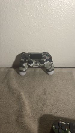 White and green ps4 controller with charger