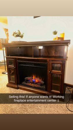 Fireplace and entertainment center with working fireplace