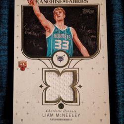 2025 Topps basketball Liam McNeeley Franchise Fabrics Rookie Jersey Card Hornets
