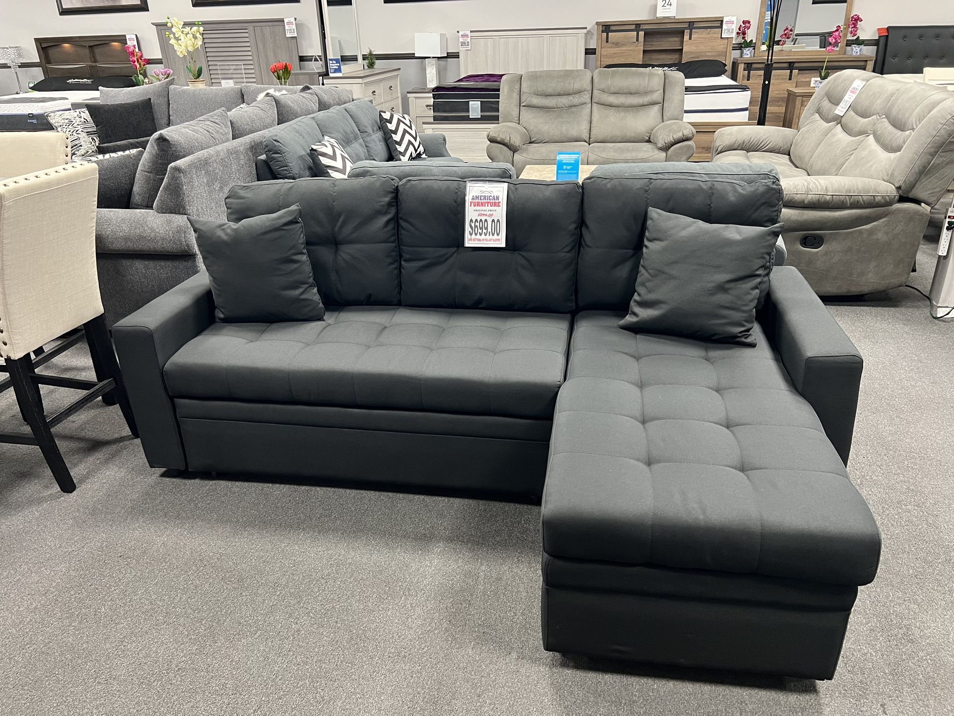 Black Sofa Sectional w/ Pull- Out Sleeper & Storage In Chaise 