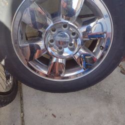 1 Stock 20" GMC Rim And Tire