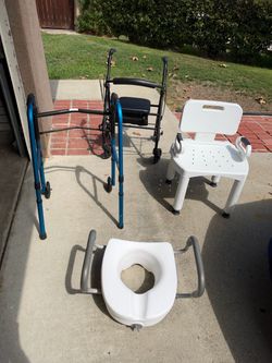 2 walkers, toilet riser,  shower chair