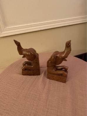 A pair of Vintage hand carved Hardwood Elephant Bookend .