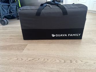 Guava family travel crib