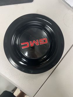 A set of GMC floating caps