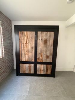 High end Murphy bed with Reclaimed Wood Doors