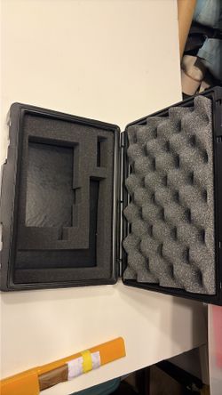 Rugged black hard shell protective case with foam