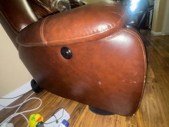 Electric loveseat with middle storage and cupholders