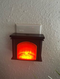 Fake fireplace plug in