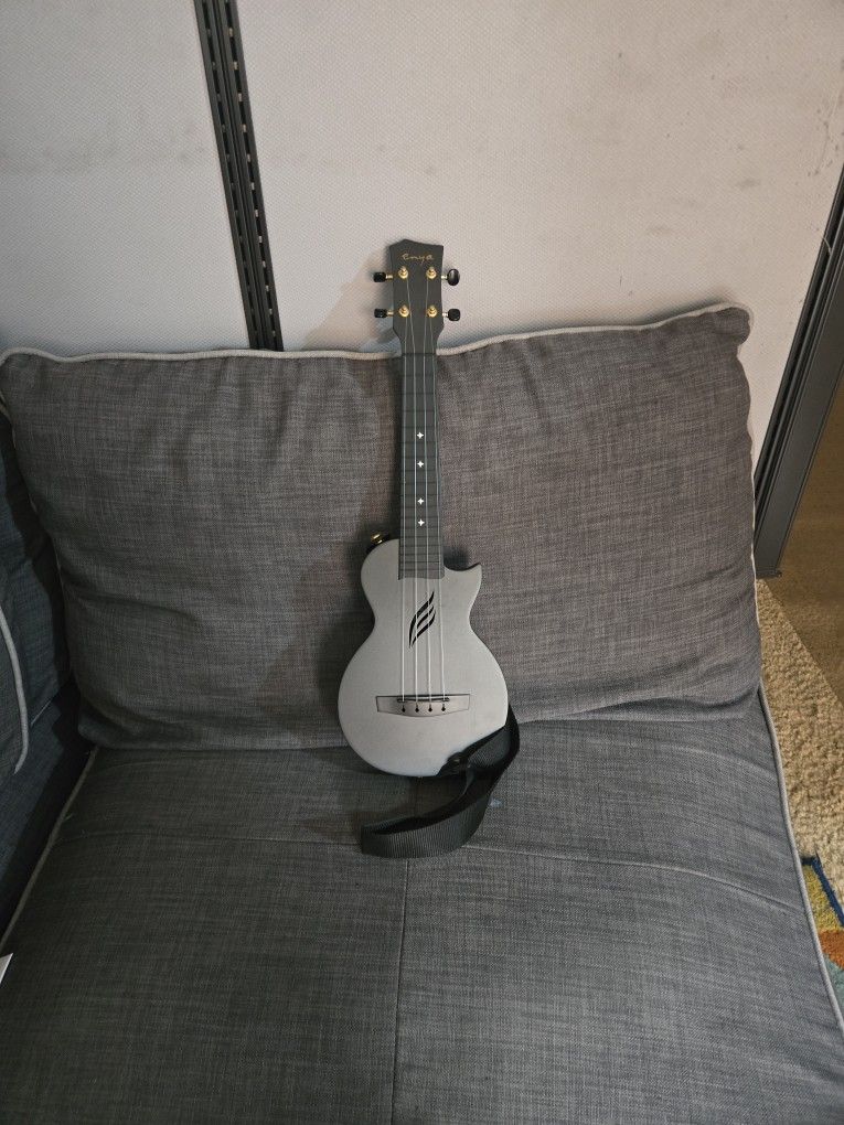 Ukulele With Case And Extra Strings
