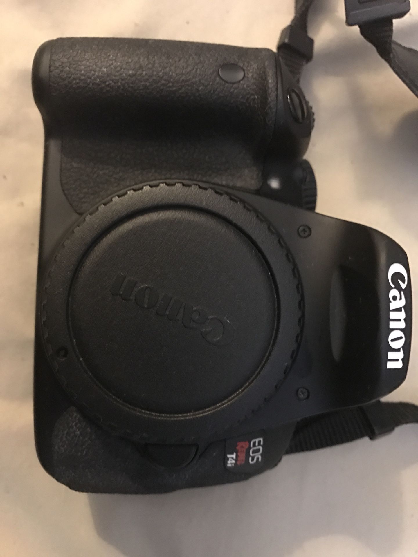 Canon T4i w/ lense, flash, and battery pack