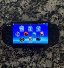 PSVita 1000 8gb charger included (cash only)