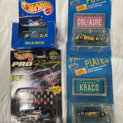 Two Hot Wheels From The 80S And Two Hot Wheels From The 90S