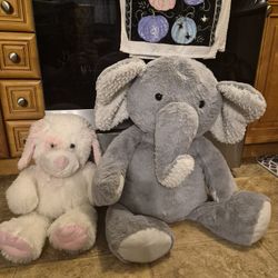 Big Stuffed elephant and stuffed puppy