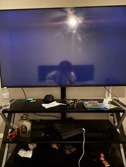 65” Vizio with tv mount & stand included