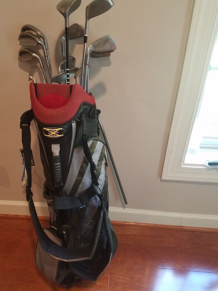 Golf clubs and golf bag- $75