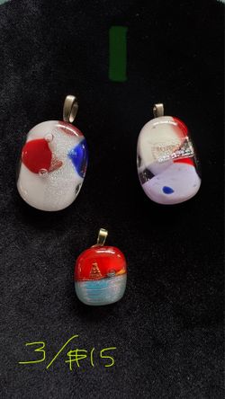 Dichroic glass pendants starting at