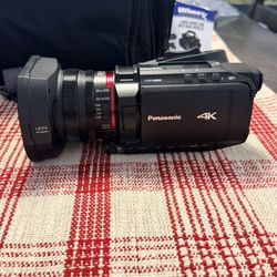 Panasonic AG-CX350 4K Professional Video Camcorder with 2 Pack 64GB SanDisk Memory Card + Case + Tripod + Wideangle Lens + LED Flash + Microphone + Fi