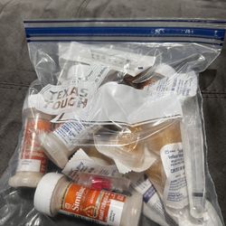 Formula Milk, Syringes And A Wipe Warmer