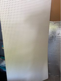 Free::    Two pieces 8 x 3 1/2 peg boards