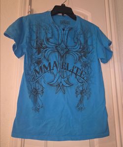 MMA Elite Y2K adult size S 
Blue T- shirt 👕