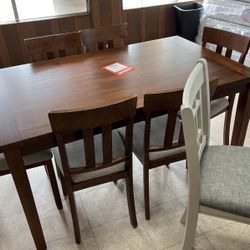 Brand new dinette and six chairs $600