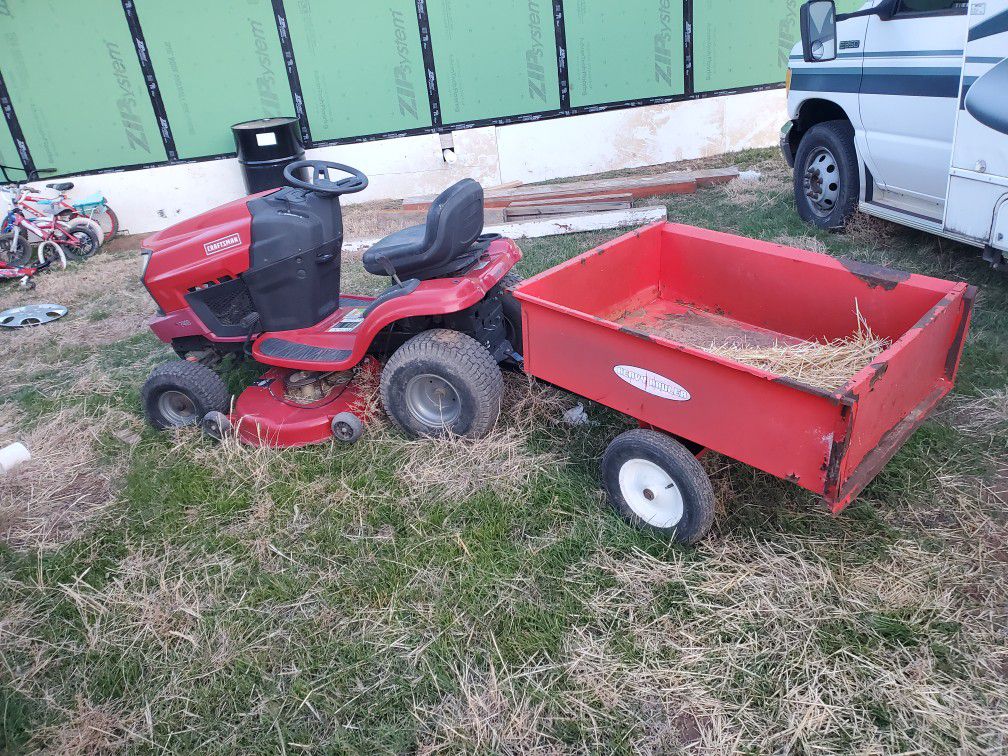 Riding mower with a little pull trailer