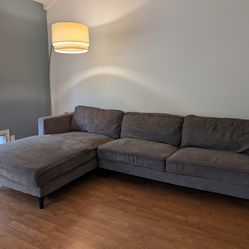 Living spaces gray cosmos sectional sofa MCM style