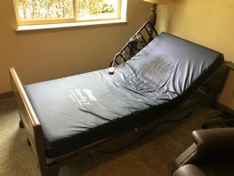 Hospital bed with controls