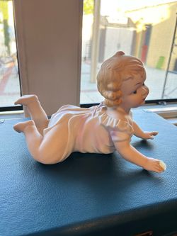 Porcelain Crawling Baby Girl Figurine