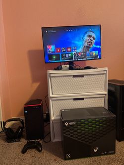 Xbox Series X with black controller