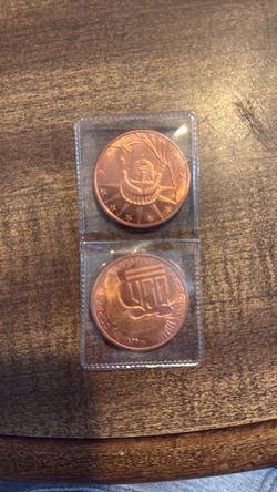 Copper Round Coins in Plastic Holder