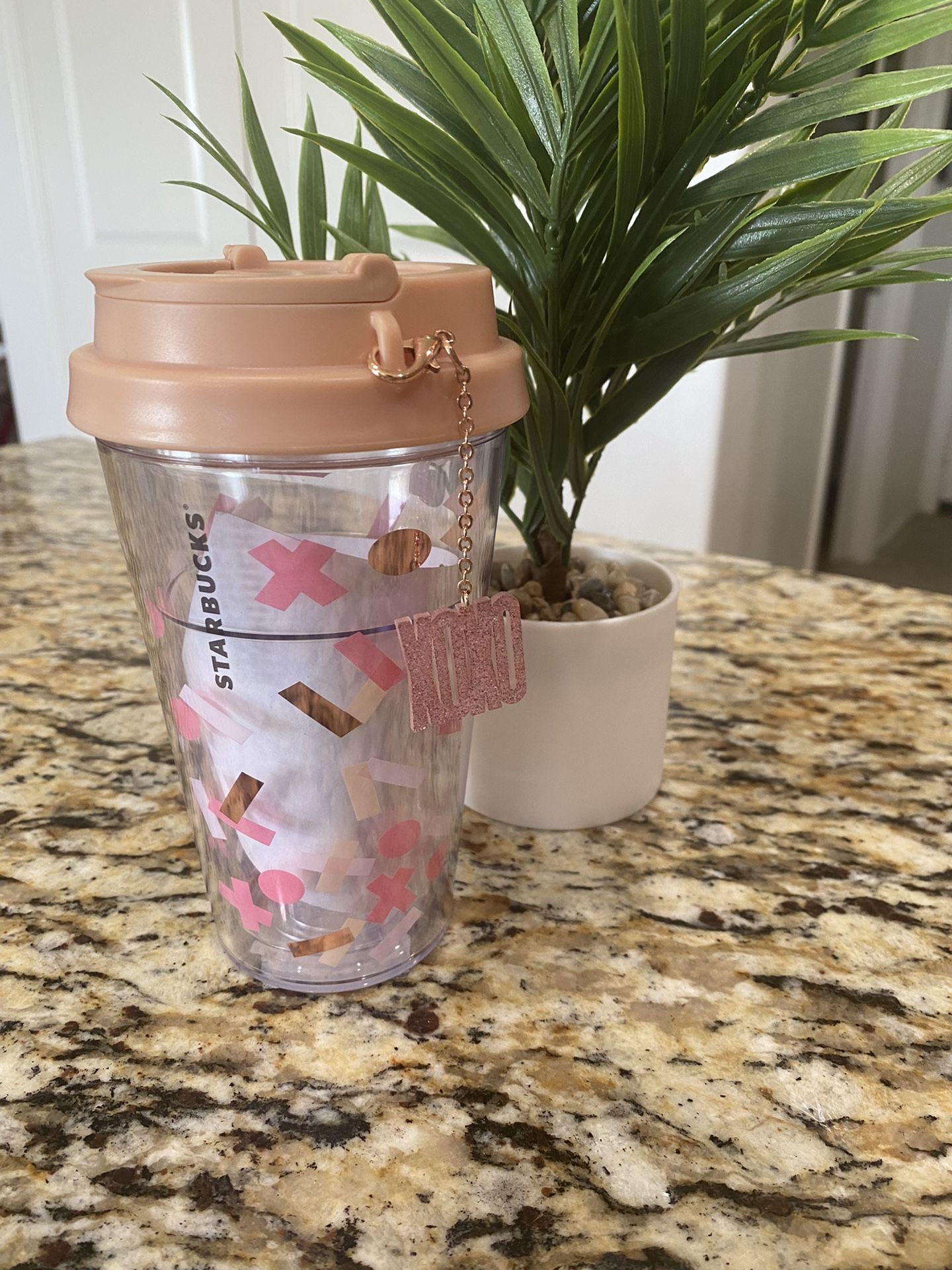 Starbucks XOXO tumbler with charm