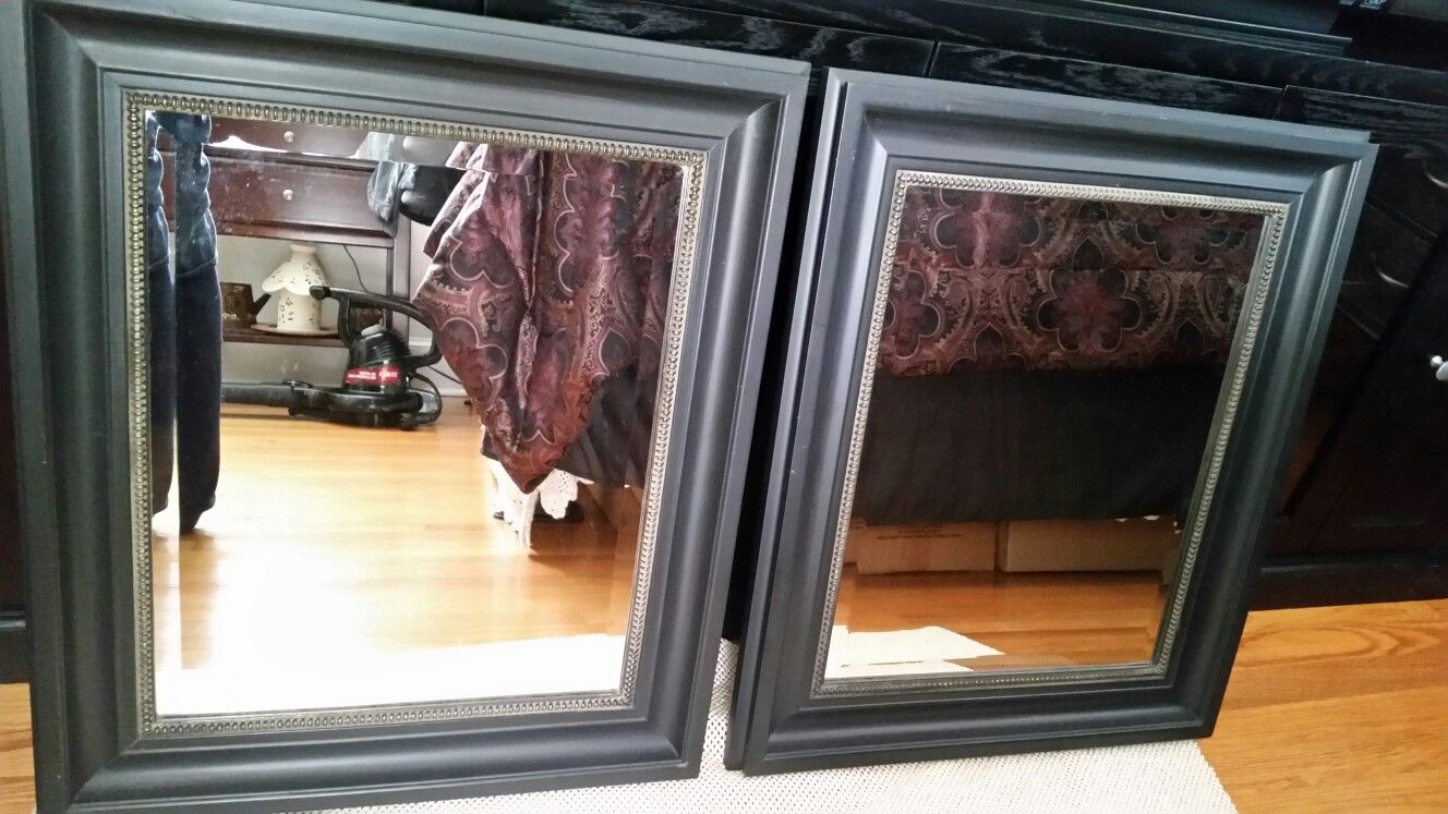 Pair of black wood and beveled glass mirrors