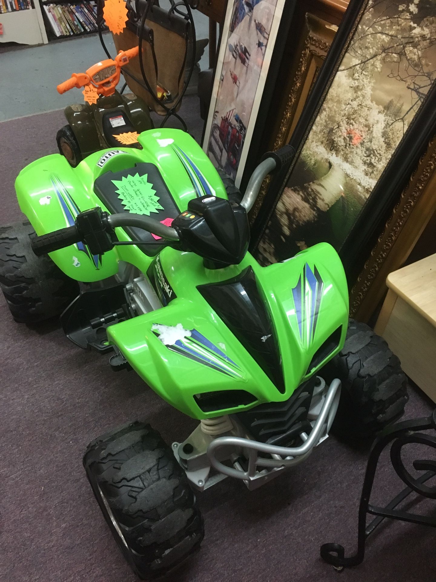 Green Kawasaki Power Wheels 4-wheeler