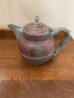 Antique copper teapot