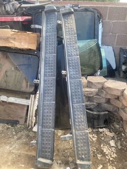 OEM running boards designed for a 2003–2009 (4th Generation) Toyota 4Runner