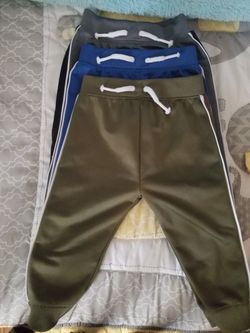 3 baby pants like new 12 months