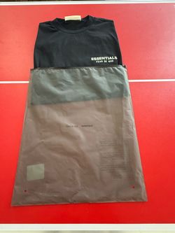 Jet black fear of god essitiqls tee