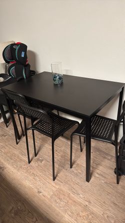 Small table and 4 chairs
