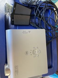 Toshiba Projector - cords included - Samsonite briefcase bag included as well