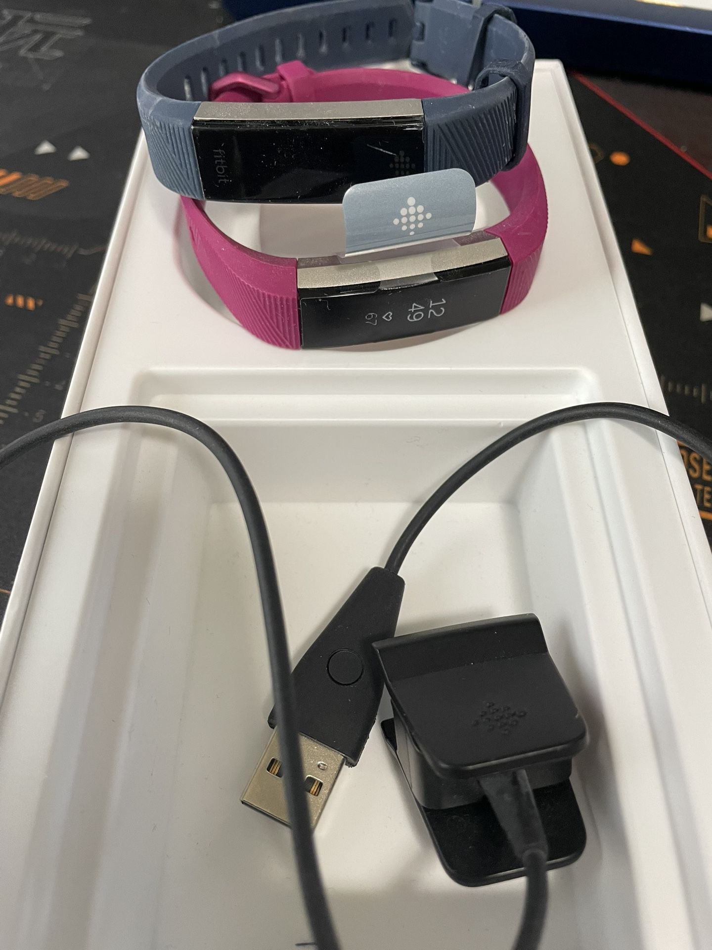 Two Fitbit Alta HR