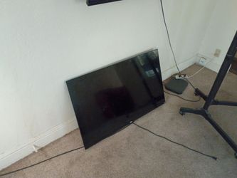 Smart Flat Screen TV with stand
