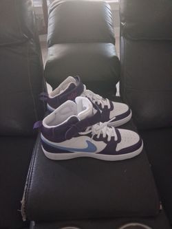 Purple Nike shoes