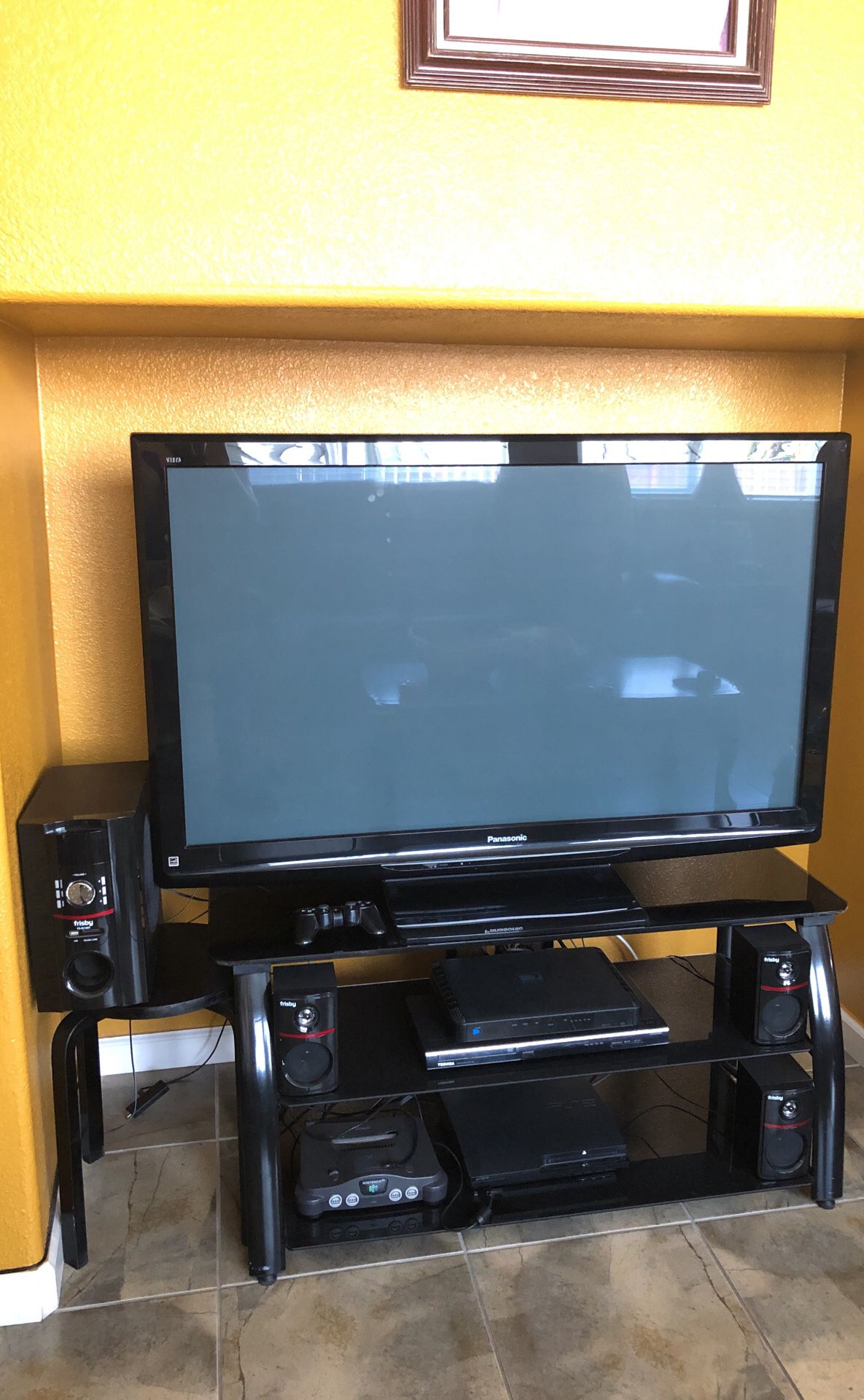 Panasonic plasma 50’ tv with Bluetooth surround sound system and tv stand