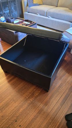 Dark Brown  Ottoman Coffee Table  Leather type material with storage.