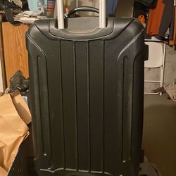 Black Suicase! 23”x15”-10”.